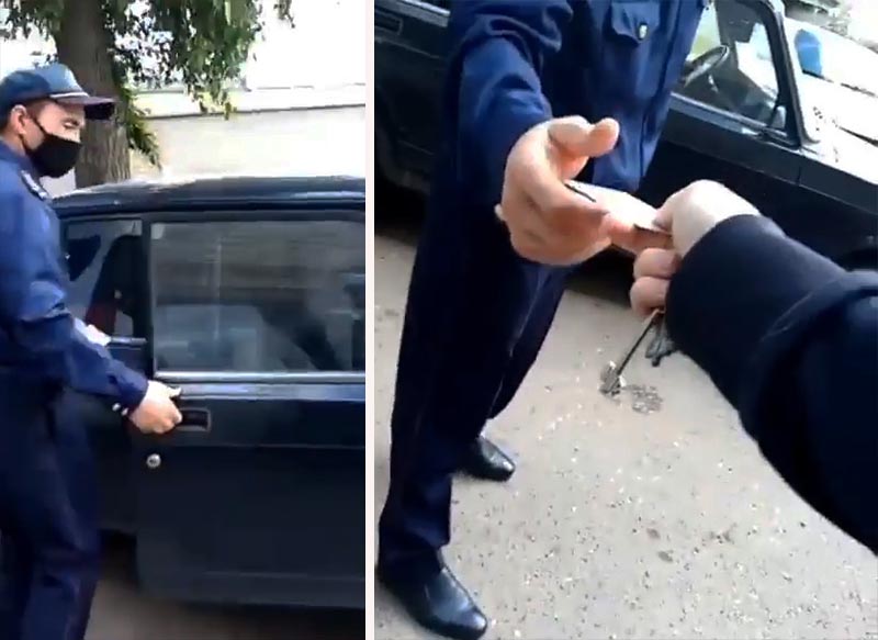 На видео сняли, как полицейские забирают удостоверение личности у жителей оцепленного дома в Уральске ( видео)